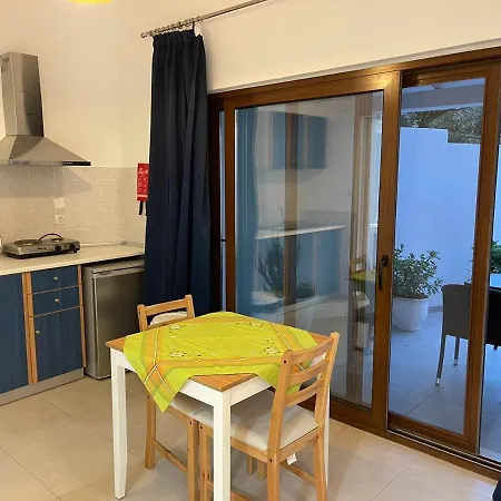 Sunset & Konukevi Koukounaries